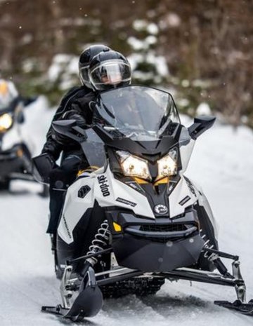 A group of snowmobilers